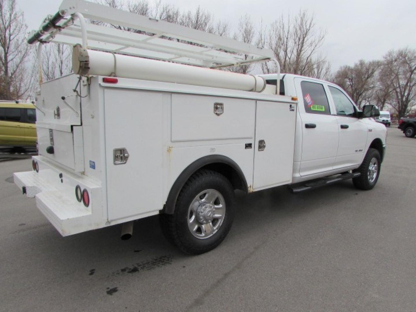 2020 White /Gray RAM 3500 Tradesman Crew Cab 4WD (3C63R3GJ0LG) with an 6.4L V8 OHV 16V engine, 8 speed automatic transmission, located at 4562 State Avenue, Billings, MT, 59101, (406) 896-9833, 45.769516, -108.526772 - 2020 RAM 3500 Tradesman Crew Cab 4WD Service Body - One owner! 6.4L Heavy Duty Hemi V8 Engine - 8 speed 8HP75-LCV Automatic Transmission - 4WD - Steel Service Body - Wyoming one owner - 72,697 miles - Inspected and serviced - Ready to head to the jobsite today! Tradesman level 2 equipment grou - Photo#3